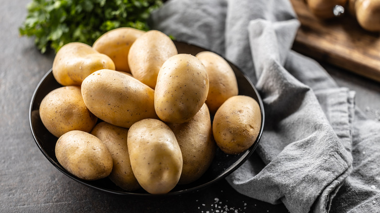 raw potatoes in bowl