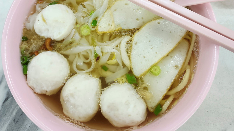 Teochew noodle soup in pink bowl with pink chopsticks