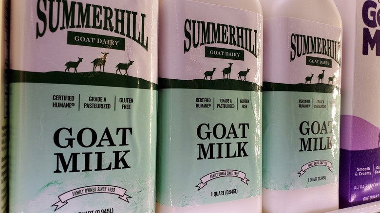 Bottles of goat milk on a shelf