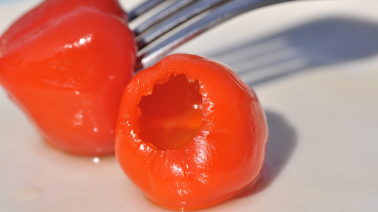 two pickled Peppadew peppers