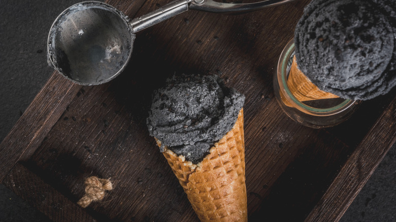 Black ice cream in waffle cones