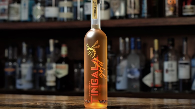 A bottle of Tingala gold on a bar