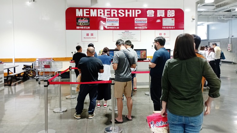 Shoppers in line for a Costco membership