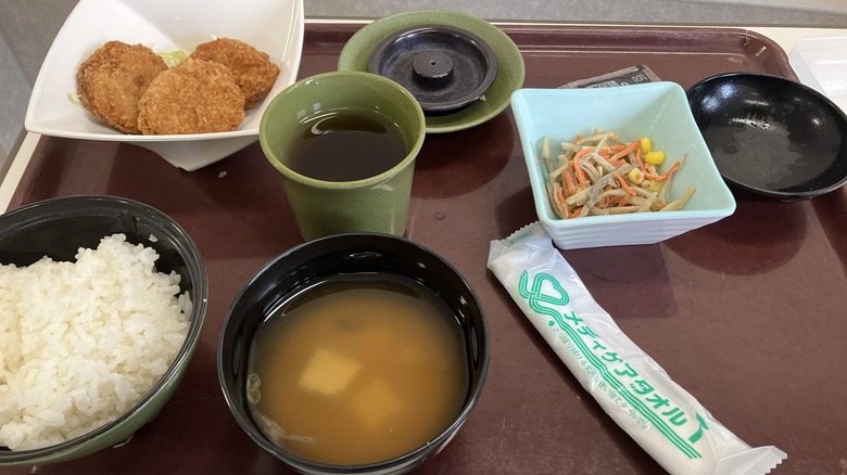 Pork, salad, rice, and miso soup