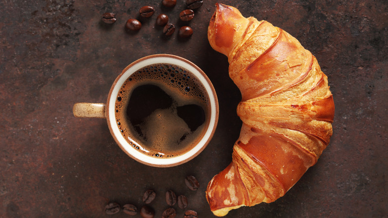 cup of coffee and croissant 