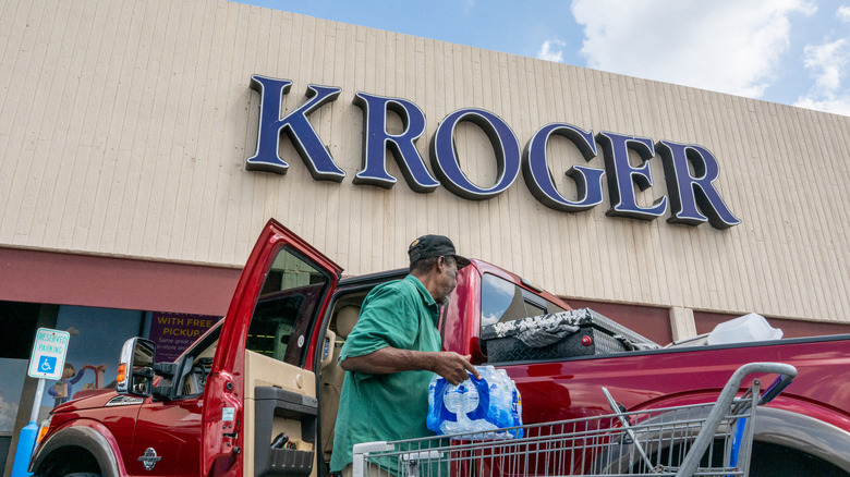 Shopper loading his truck outside a Kroger store