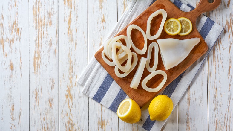 raw calamari and lemon slices