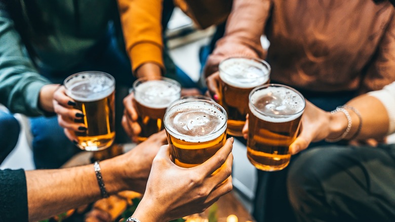 friends enjoying happy hour beers