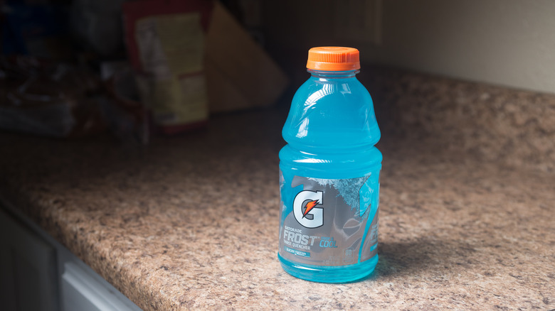 Bottle of light blue Glacier Freeze Gatorade on a counter