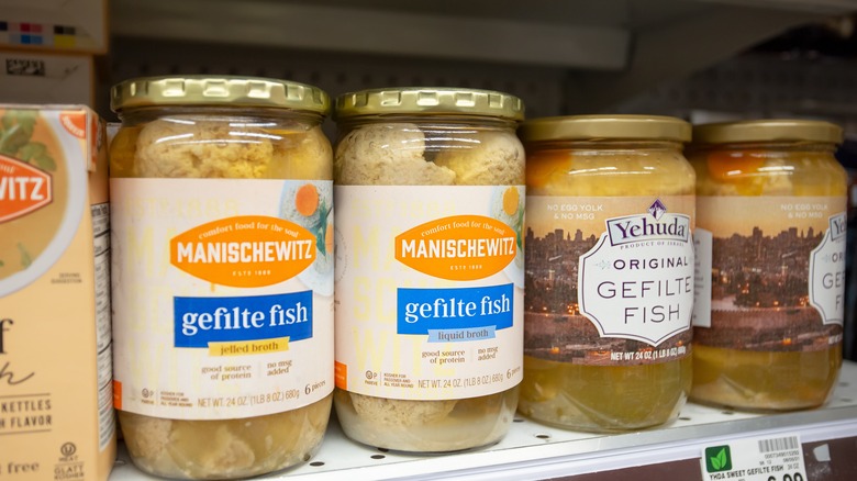 Jars of gefilte fish on a store shelf