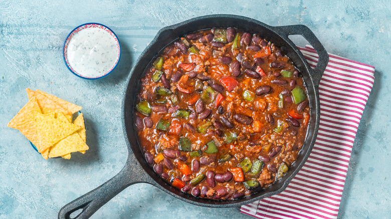 pan of chili with chips