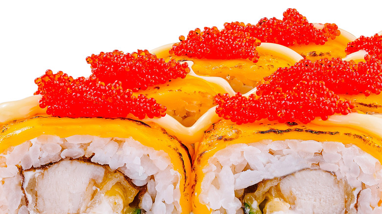 Bright masago-topped sushi roll