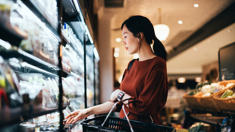 Woman shopping at grocery store