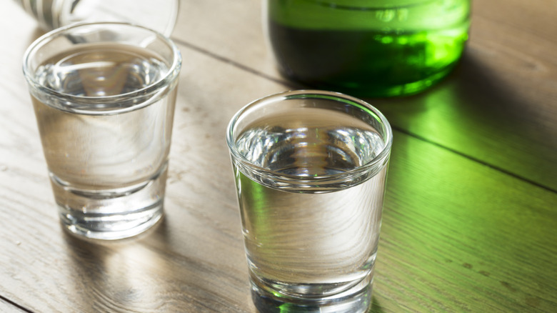 Glasses of soju and bottle