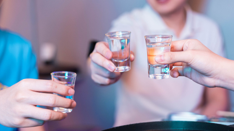 Group of friends sharing soju
