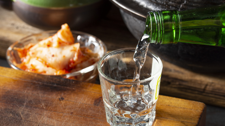 Soju being poured at restaurant