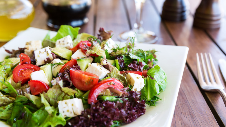 gourmet salad with cheese cubes