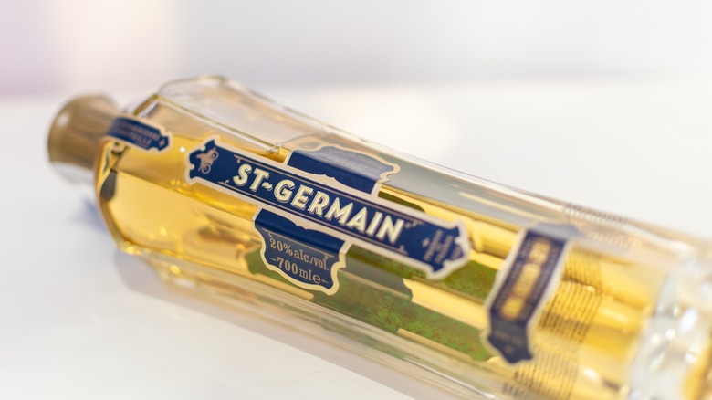 bottle of St-Germain lying down