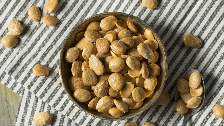 A bowl of salted Marcona almonds