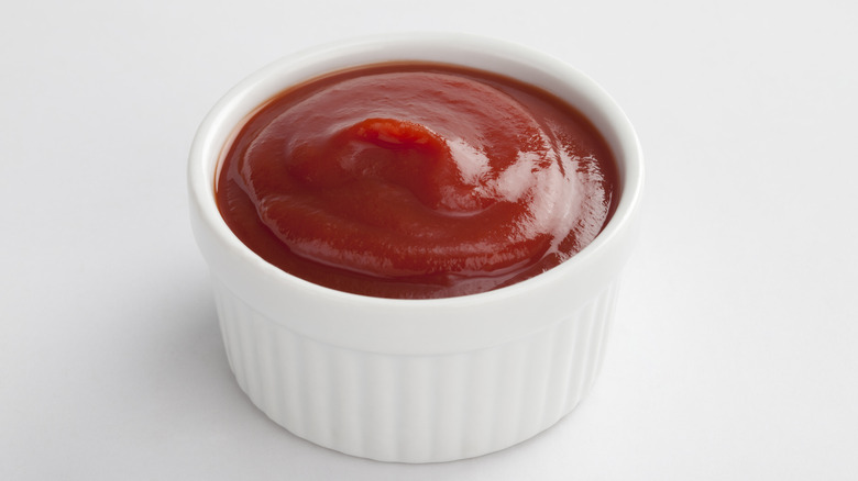 Tomato ketchup in a white ramekin