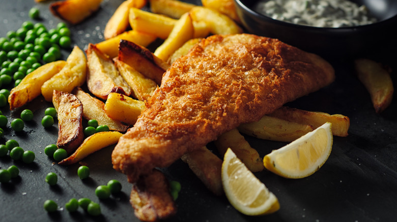 Battered fish over fries