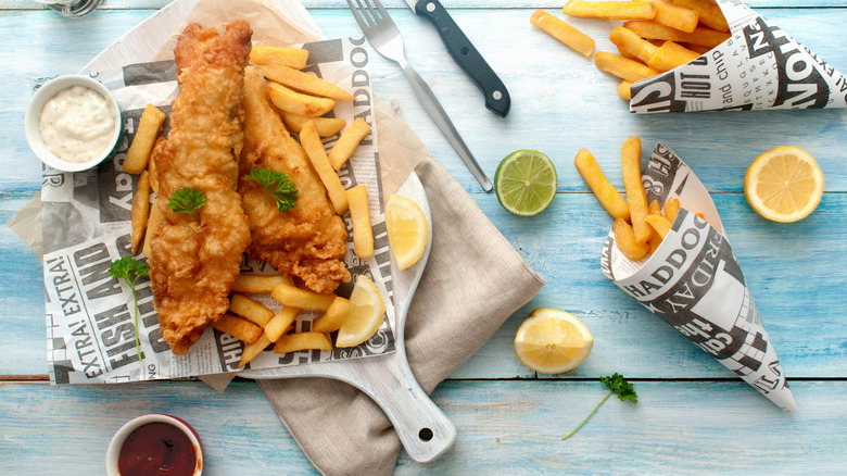 Fish and chips on wooden board