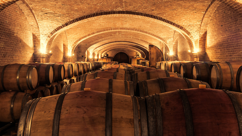 Brick cellar with wooden barrels