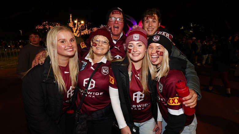 Rugby fans in Maroons attire