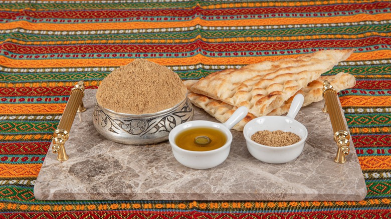 Za'atar seasoning with bread on a tray