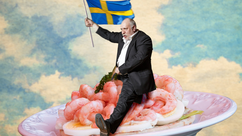 Swedish man riding a shrimp sandwich