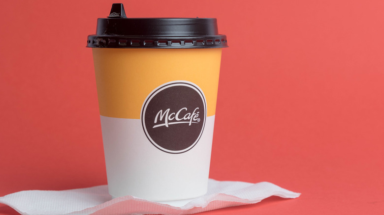 cup of McCafe coffee on napkin