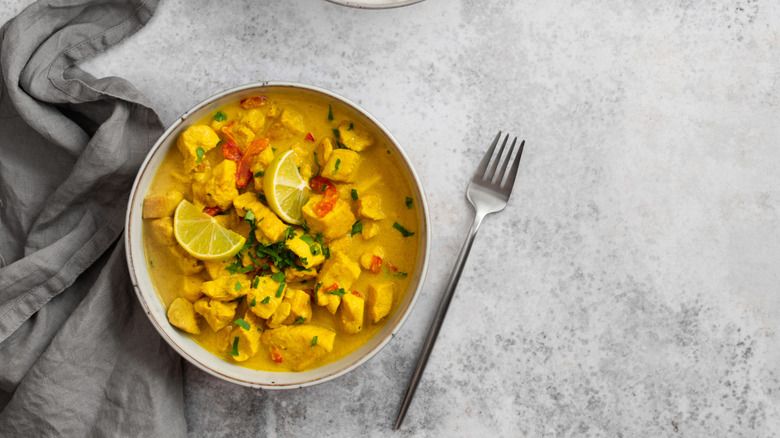 served bowl of curry chicken