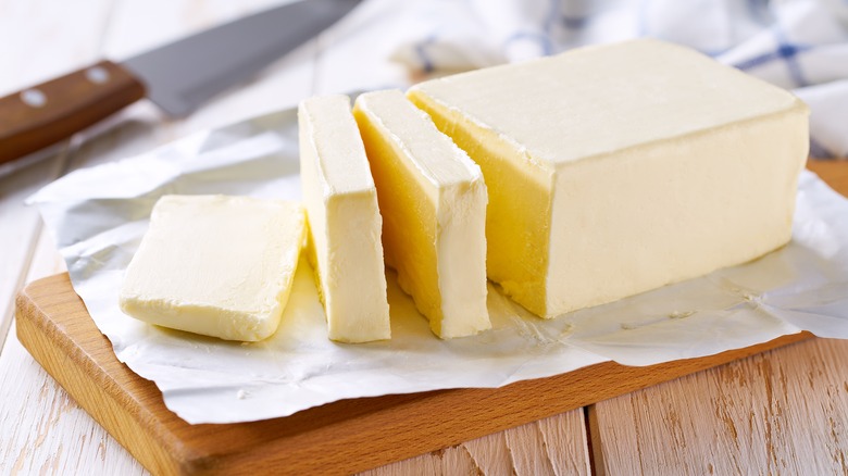 a woman shopping for butter