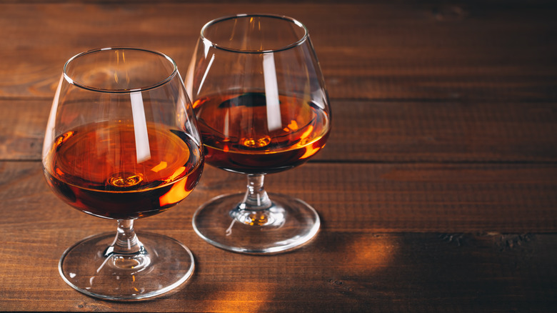 glasses of cognac on table