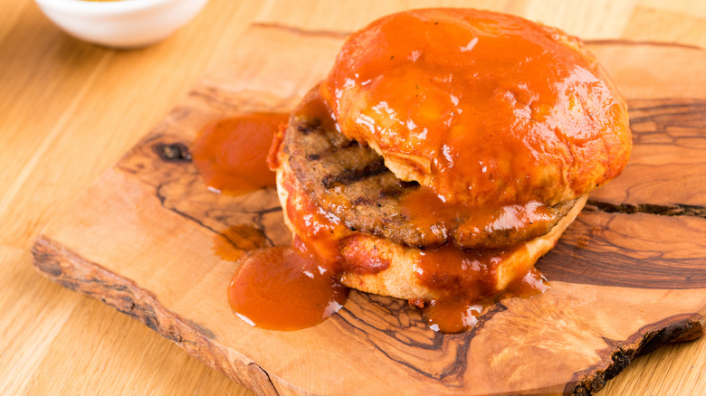 Turkish islak burger on wooden platter