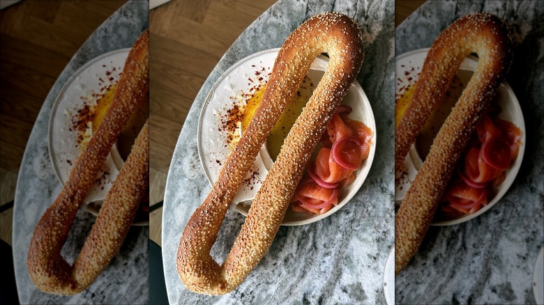 Jerusalem bagel with labneh and smoked salmon