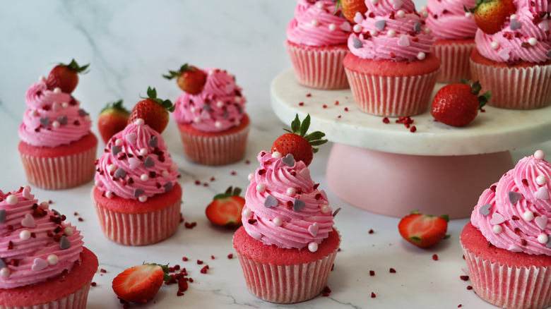 Pink velvet cupcakes with strawberries