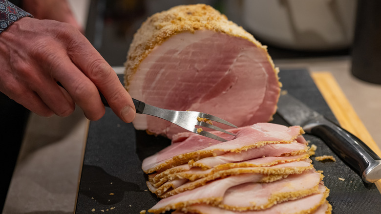 A whole ham cut in slices