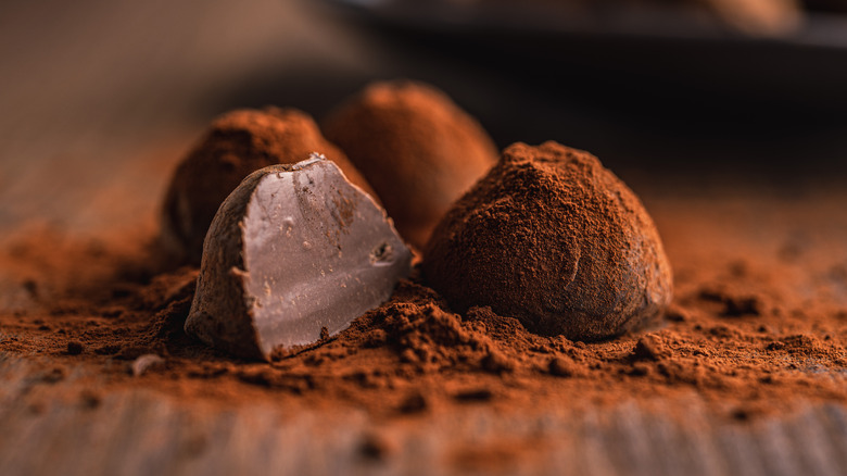 Cocoa dusted truffles on a table