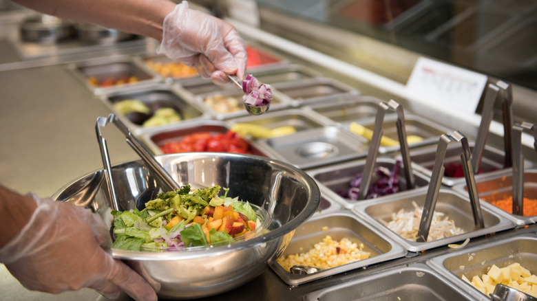 Customized salad being made at Sweetgreen.