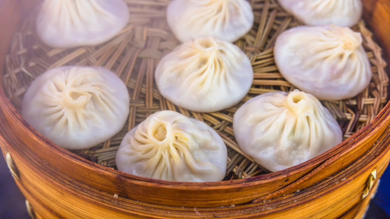 Soup dumplings in a steamer basket