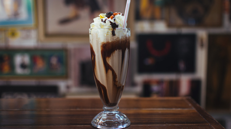 Milkshake in a glass with toppings