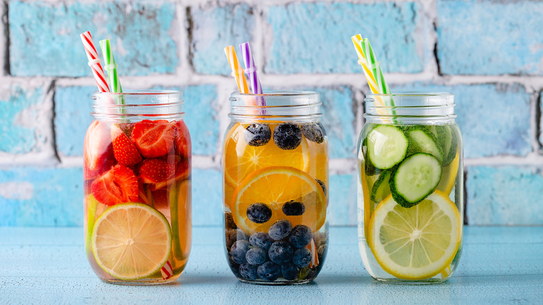 Mason jars of fruit infused water