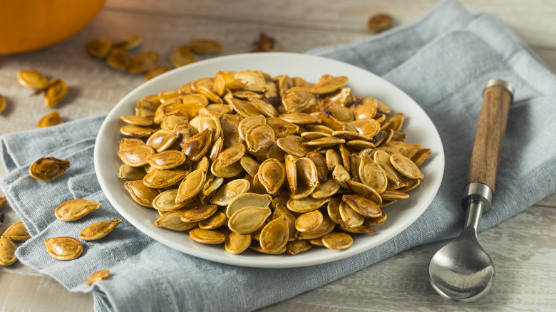 dish of roasted pumpkin seeds