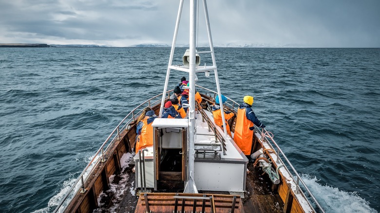 Fishing crew on water