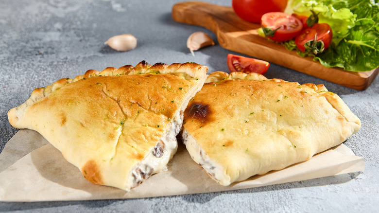 Traditional calzone cut in half