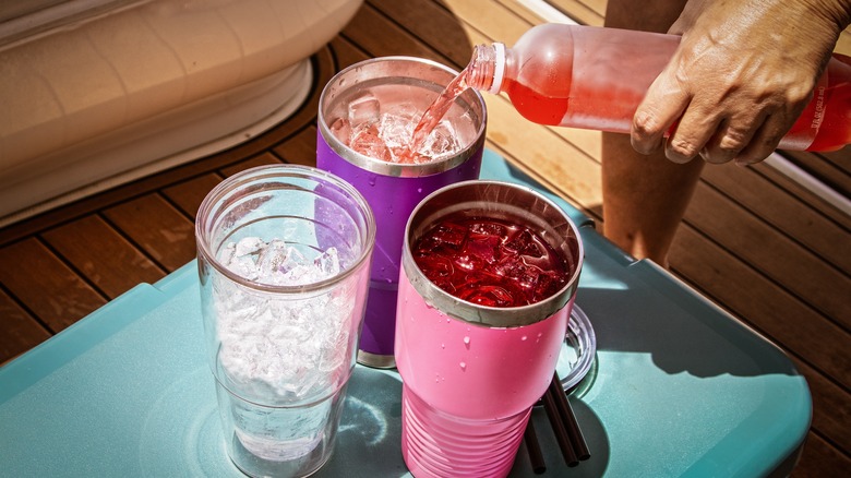 pouring drink into cup