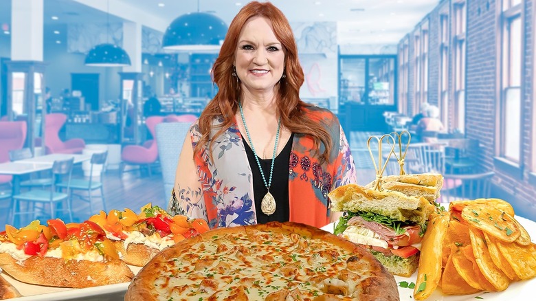 Ree Drummond surrounded by various dishes
