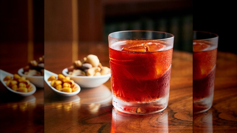 A Negroni with warm nuts in the Library Bar at The Lanesborough