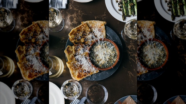 A delicious plate of spanakopita gratin malawach at Oma